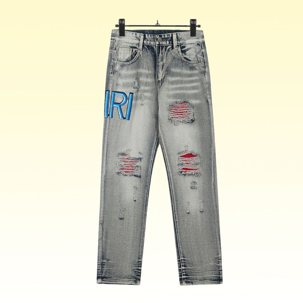 Amiri Jeans With Blue Letters On The Legs